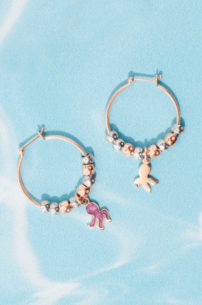 Bracelets And Necklaces Decorated With Charms