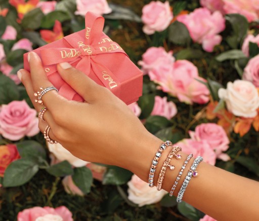 A Hand Holding A Gift Box