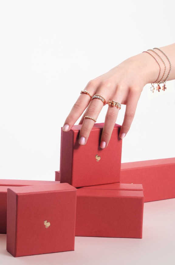 Hand Holding Gift Boxes