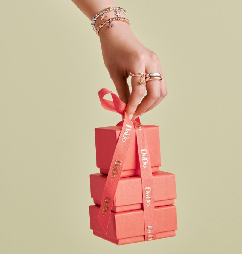 Hand Holding Gift Boxes